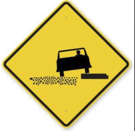 soft shoulder yellow road sign