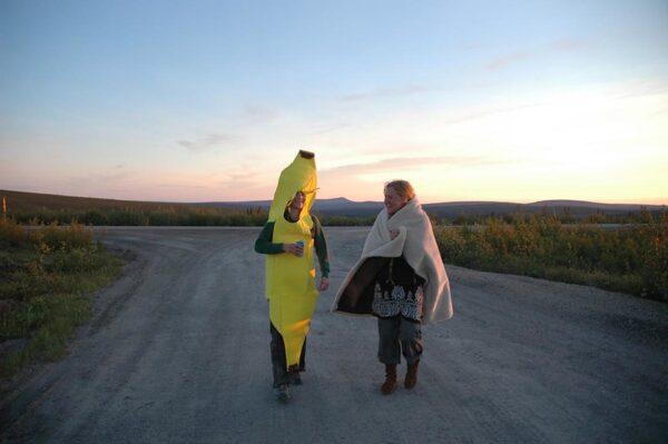 Banana walking on road 