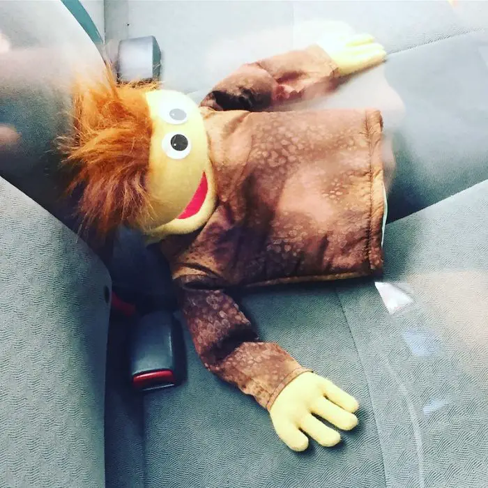 puppet in the car 